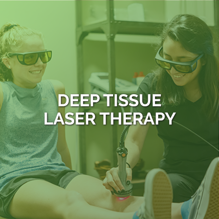 Staff Member With Laser Therapy Patient