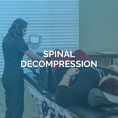 Staff Member With Patient In Decompression Machine