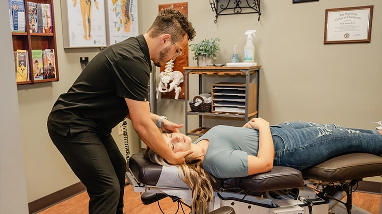 Chiropractor Eric Rivera Adjusting Patient